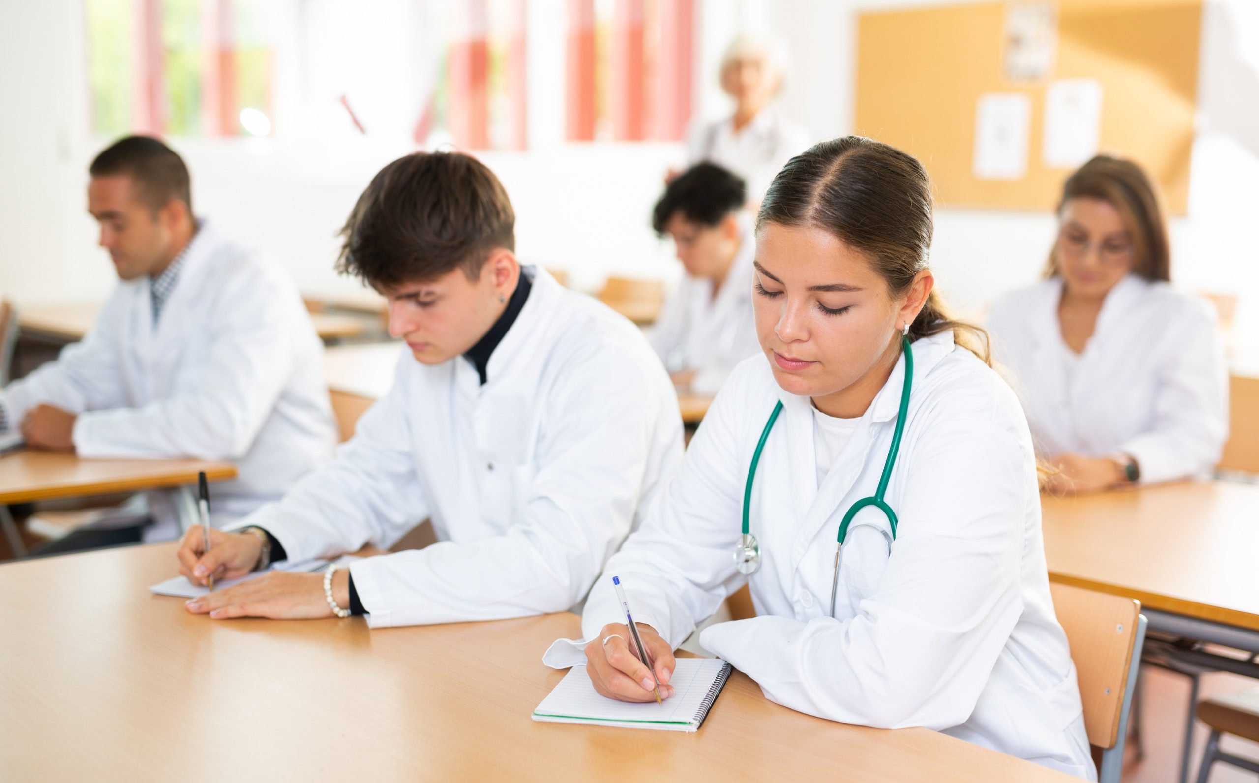 A group of students learning about nutrition in medical school